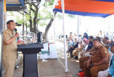 Disperdagin dan Bulog Launching KOSPI di Pasar Pasalaran