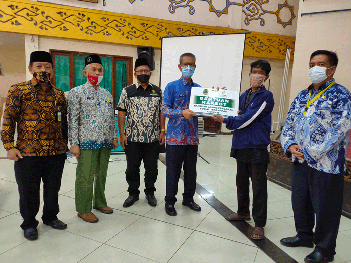 Baznas Salurkan JPS Guru Honor dan Marbot Masjid