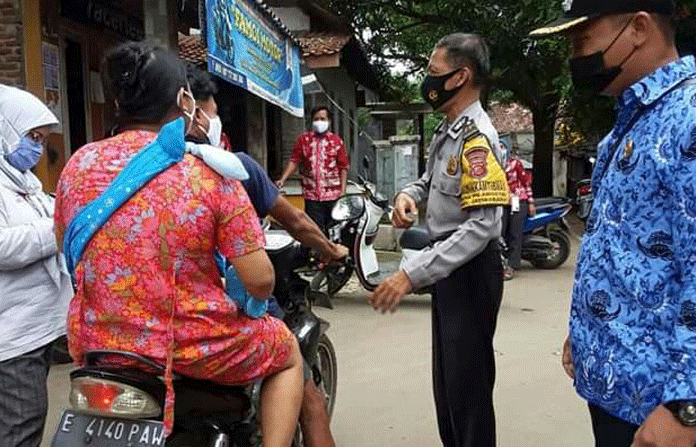 Petugas Gabungan Grebeg Covid Hingga ke Pelosok Desa